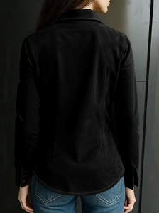Back view of elegant black long sleeve polo shirt showing slim fit cut and white stitching