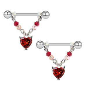 Piercings de téton cœur du diable avec gemme rouge et ailes sur fond blanc