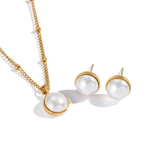 Elegant gold stainless steel jewelry set with white pearls including necklace and earrings