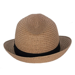 Close-up of fine woven straw texture and black ribbon detail on summer sun hat