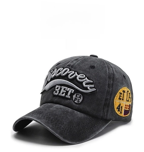 Close-up of vintage embroidery and retro round patch on washed cotton baseball cap