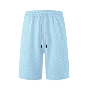 Men's light blue casual shorts with textured herringbone fabric and drawstring waist