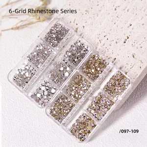 Flatback nail art rhinestones set in clear 12-grid box with assorted silver and gold crystals