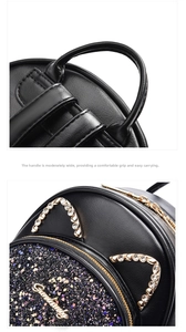 Detail of cute cat ear backpack with sequins, gold hardware, and smooth leather texture