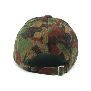 Close-up of camouflage corduroy baseball cap back with adjustable silver metal buckle