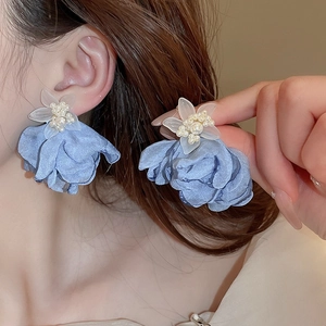 Ethnic style flower earrings with blue fabric petals and cat eye stone for women