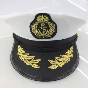 Detailed view of nautical captain hat with gold anchor embroidery and laurel leaves