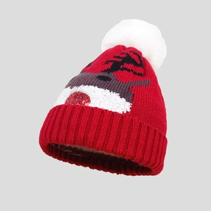 Bonnet de Noël rouge tricoté avec motif renne et grand pompon blanc pour l'hiver