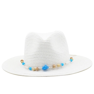 White woven Panama sun hat for men and women featuring a colorful beaded ethnic style band
