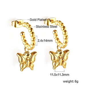 Detail of 18K gold plated stainless steel C-shape earrings with butterfly charms
