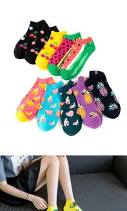 Detail view of breathable combed cotton low-cut socks with colorful fruit patterns
