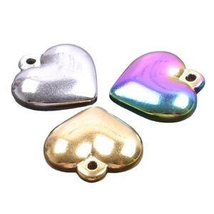 3D heart pendants in silver, gold, and rainbow finishes on a clean white background