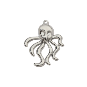 Macro detail of silver octopus pendant in polished stainless steel for DIY jewelry