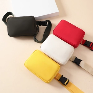Versatile nylon sports belt bags in black red white and yellow with adjustable straps