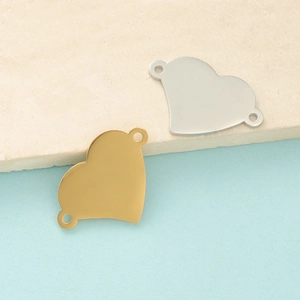 Gepolijste hartvormige hangers in goud en zilver met dubbele gaten voor DIY sieraden maken