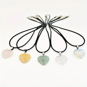 Set of five heart-shaped natural crystal pendant necklaces in various quartz colors