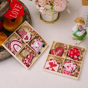 Valentine's Day wooden hanging ornaments set with pink hearts and gnomes in box