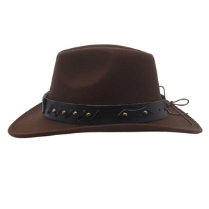 Detail of western cowboy hat featuring brown felt texture and studded leather band