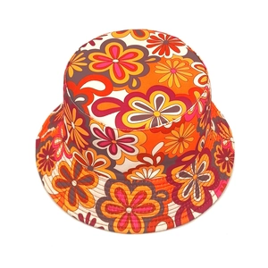 Women's vintage floral bucket hat featuring vibrant patterns and outdoor sun protection