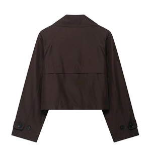 Back view of a cropped dark brown trench coat featuring a double-layer storm flap and cuffs
