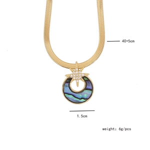 Detail view of gold necklace with abalone shell pendant showing size and weight specs