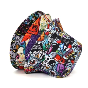 Graffiti print bucket hat for men and women showing double-sided street style design