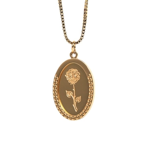 Vintage stainless steel oval rose pendant necklace with double layer gold finish on white background