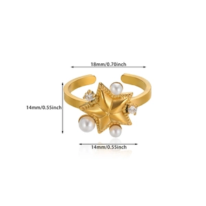 Detail view of 18K gold star ring with pearl and diamond inlays plus size dimensions