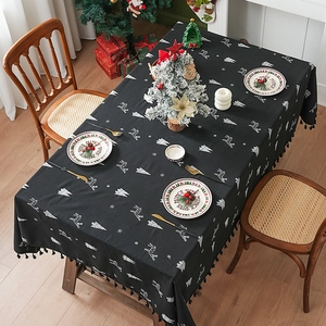 Linen Christmas tablecloth with white reindeer and snowflake embroidery and tassels
