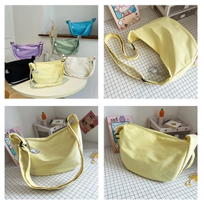 Detail view of colorful canvas dumpling bags in multiple colors with cute pendants