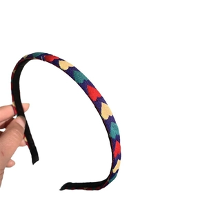 Handheld colorful heart pattern fabric headband with navy blue and red sweet design