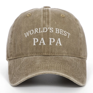 Macro detail of World's Best Papa white embroidery on khaki washed cotton baseball cap