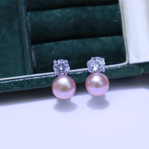 Elegant pink freshwater pearl earrings with sparkling white stone stud in silver finish