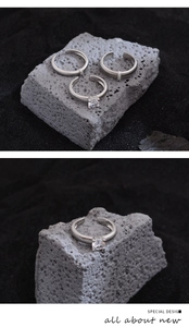 Macro shot of S925 sterling silver rings with zircon inlay and striped texture finish
