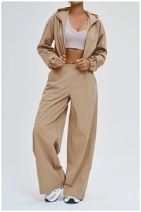 Outdoor sun protection sports set featuring khaki hooded jacket and wide leg pants
