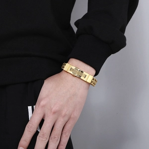 Hip hop style gold braided stainless steel cross chain bracelet for men on wrist