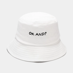 Detailed close-up of OK AND? black embroidery on white cotton bucket hat with stitching