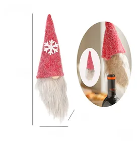 Detailed dimensions of red gnome wine bottle cover with snowflake pattern and long beard
