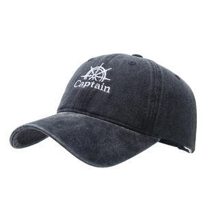 Washed black cotton baseball cap with Captain embroidery and steering wheel graphic