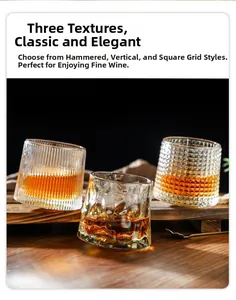 Close-up of three textured whiskey glasses featuring hammer, stripe, and checkered patterns