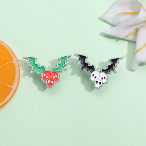 Gothic bat wing skull pins set in green and black enamel for Halloween badges