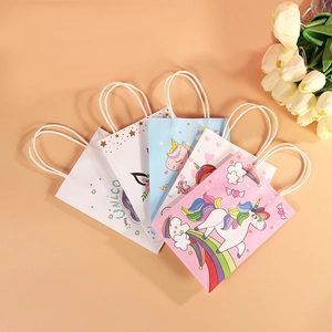 Cute cartoon unicorn paper gift bags with rope handles in pink and blue colors