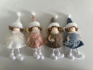 Detailed view of plush Christmas angel pendants in white, pink, brown and blue colors