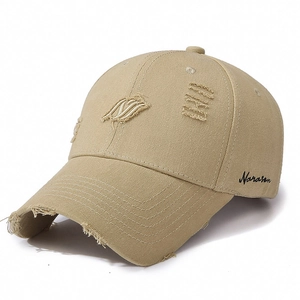 Vintage distressed khaki baseball cap with Narasan side embroidery and ripped details