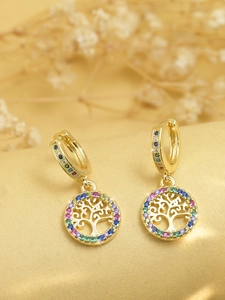 Detail of golden Tree of Life drop earrings with vibrant multi-color crystals