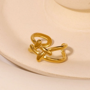 Minimalist geometric crisscross stainless steel open ring in polished gold finish