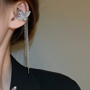 Detail of silver butterfly tassel ear cuff with sparkling zircon fringe for women