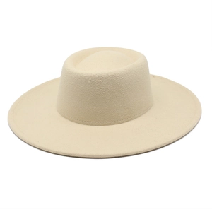 Detailed view of cream-colored wide brim hat stitching and wool felt material texture