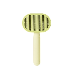Cepillo para mascotas con cabezal verde ovalado y mango ergonómico antideslizante
