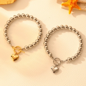 Luxuriöse Edelstahl-Perlenarmbänder mit Herzanhängern und Toggle-Verschluss